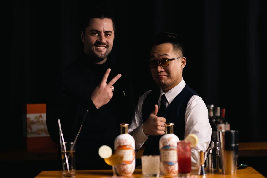 Bartenders with the Porcelain bottle collection.