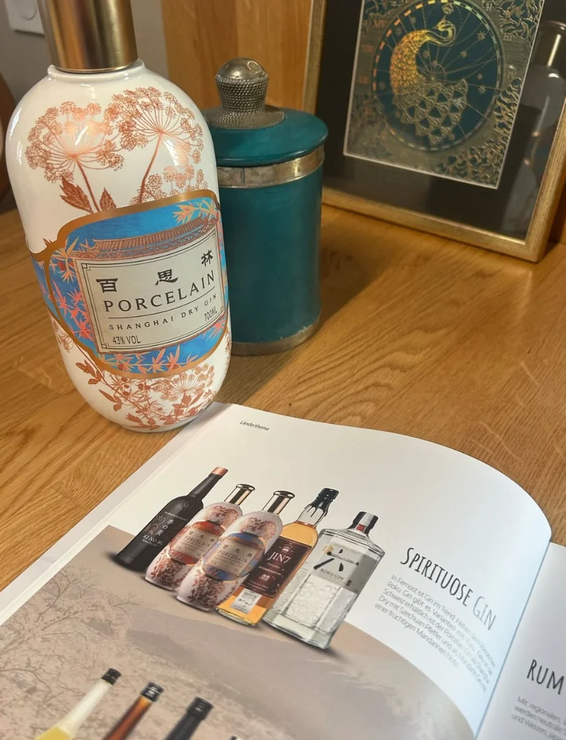 Shanghai Dry Gin beside a spirits publication.